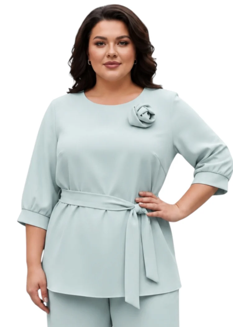 Bluzka miętowa z paskiem plus size