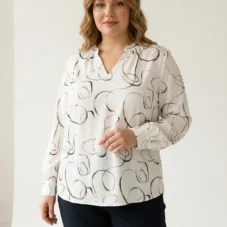 Biała elegancka bluzka w złote abstrakcyjne wzory, ujęcie z przodu, prezentujące cały fason.