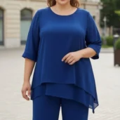 Spodnie damskie Komplet damski wizytowy: pełne ujęcie z przodu, ukazujące szerokie nogawki. - ujęcie 11